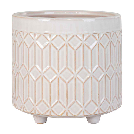 Crèmekleurige keramische pot met geometrisch patroon en drie pootjes, glanzend oppervlak, modern design.