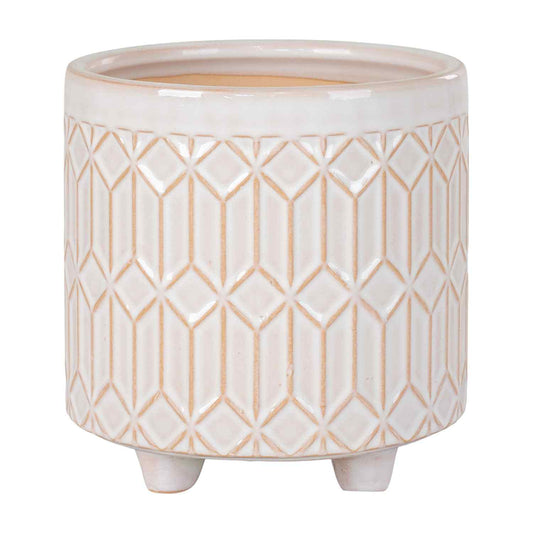 Crèmekleurige keramische plantenpot met geometrisch patroon en drie kleine pootjes.