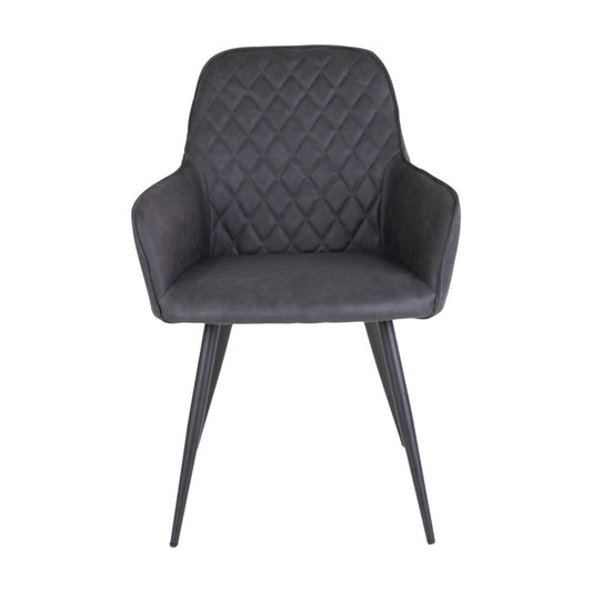 Donkergrijze, moderne stoel met gewatteerd ruitpatroon en slanke metalen poten, minimalistisch design.