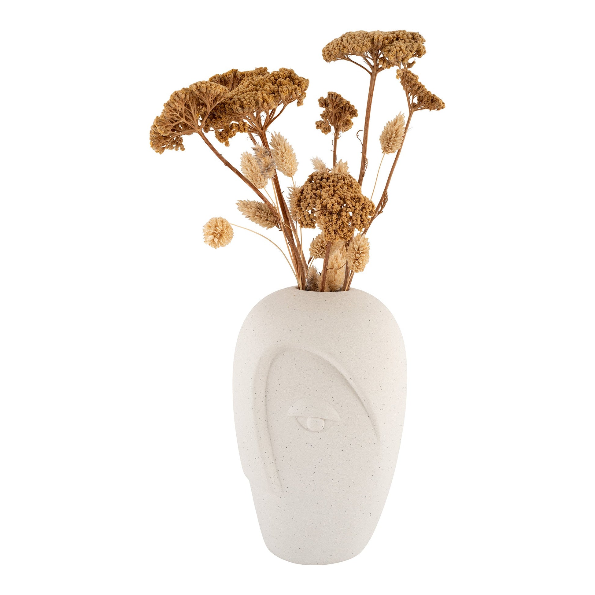 Crèmekleurige vaas in de vorm van een gezicht met gedroogde bloemen in warme aardetinten.