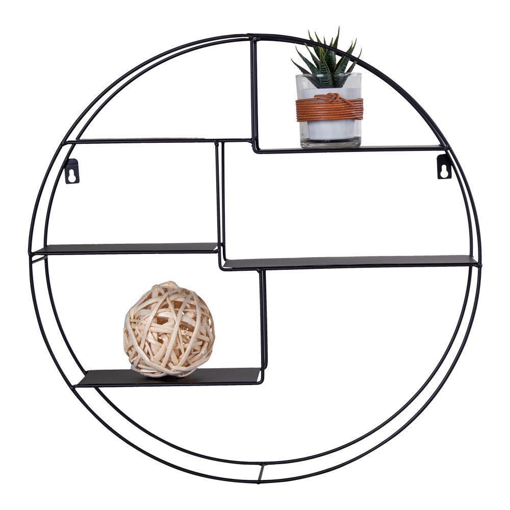 Rond metalen wandrek met decoratieve houten bal en kleine vetplant in glas, moderne strakke inrichting.