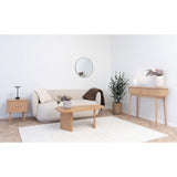 Close-up van MDF-poot in naturel van House Nordic Melo salontafel benadrukt vorm en strakke houten afwerking