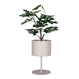 Beige stalen bloempot Ø21,5 cm op slank onderstel met glanzende groene plant, matte zandkleur voor een rustige sfeer