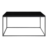 Dunne melaminetop van de House Nordic Vita salontafel (90x60 cm) in mat zwart met subtiele houtnerf en luchtig stalen frame