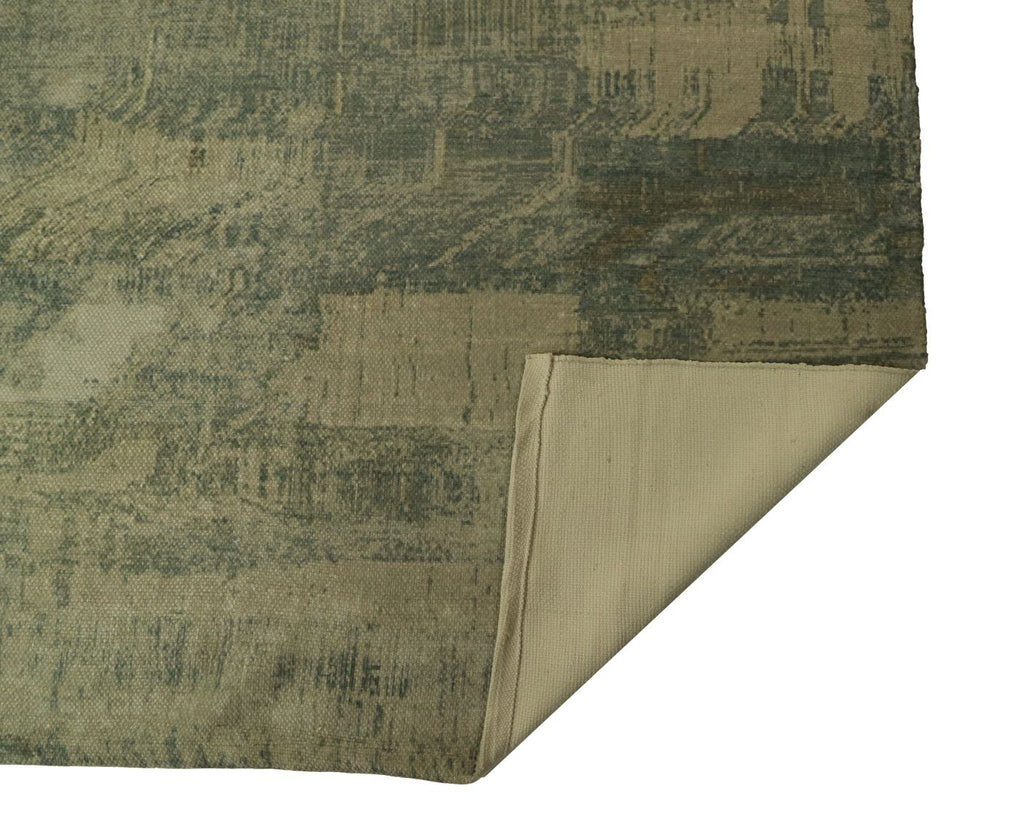 Gedetailleerde beige en groene vintage-look stof met abstract patroon, hoek omgevouwen om binnenkant te tonen.