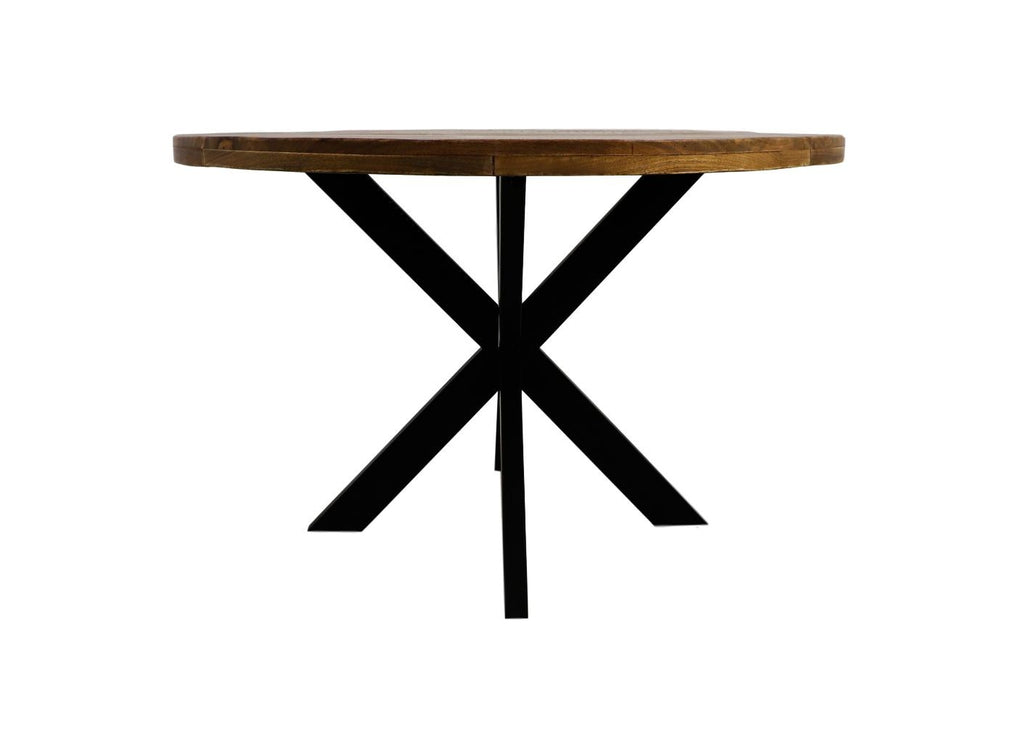 Ronde houten tafel met dik tafelblad en zwarte metalen kruisvormige poten in modern design.
