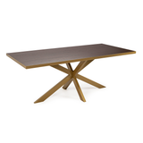 Eettafel met donker houten blad en goudkleurig metalen stervormig onderstel.