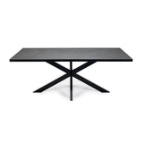 Rechthoekige zwarte tafel met elegant X-vormig onderstel en subtiele marmerlook afwerking.