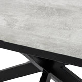 Grijze tafelblad met betonlook en zwarte metalen X-vormige poten, strak en modern ontwerp.